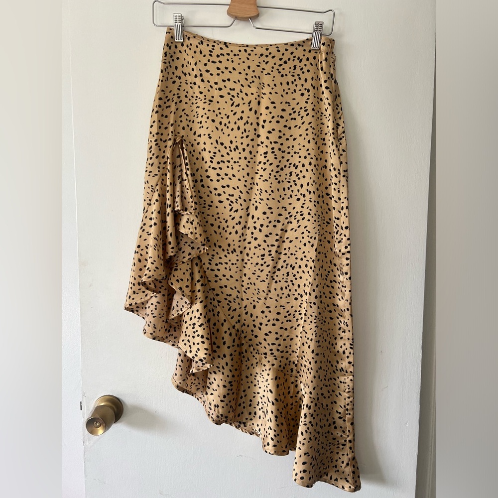 Cheetah print skirt 
Size: S
Color: black and gold